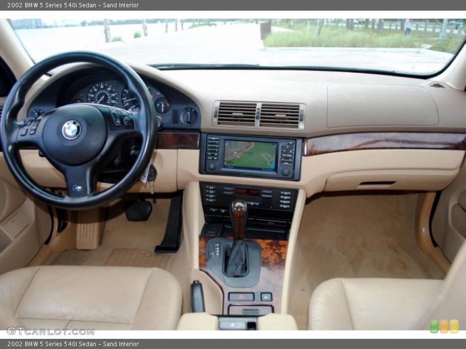 Sand Interior Dashboard for the 2002 BMW 5 Series 540i Sedan #49877651