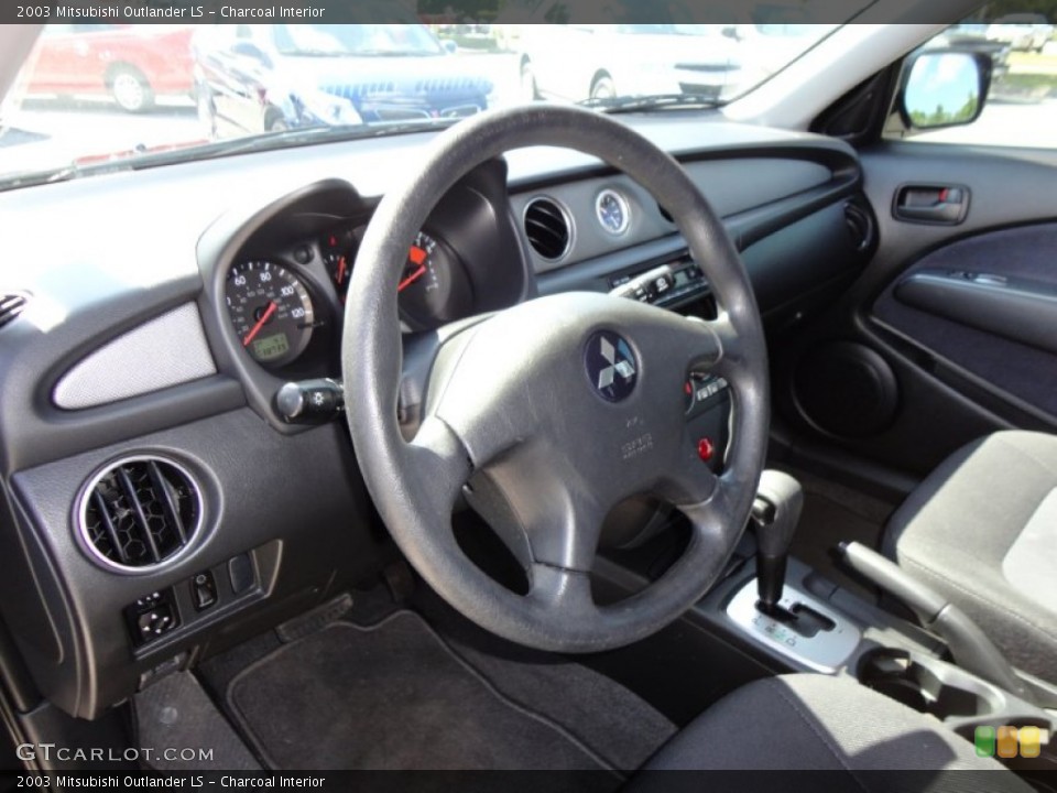 Charcoal Interior Photo for the 2003 Mitsubishi Outlander LS #49905600