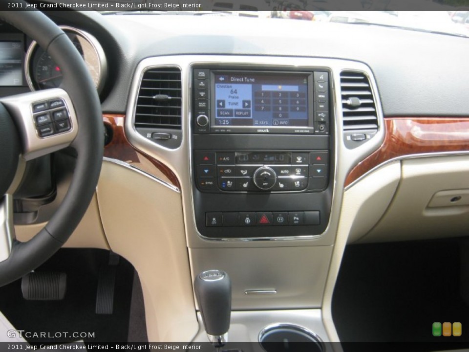 Black/Light Frost Beige Interior Controls for the 2011 Jeep Grand Cherokee Limited #49941014