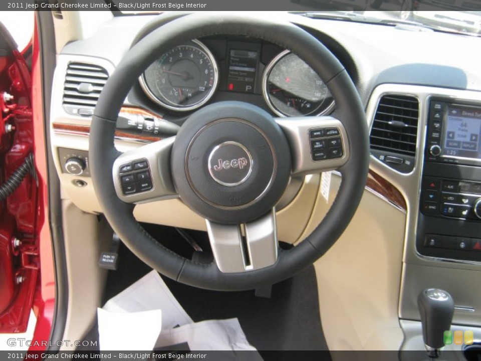 Black/Light Frost Beige Interior Steering Wheel for the 2011 Jeep Grand Cherokee Limited #49941029