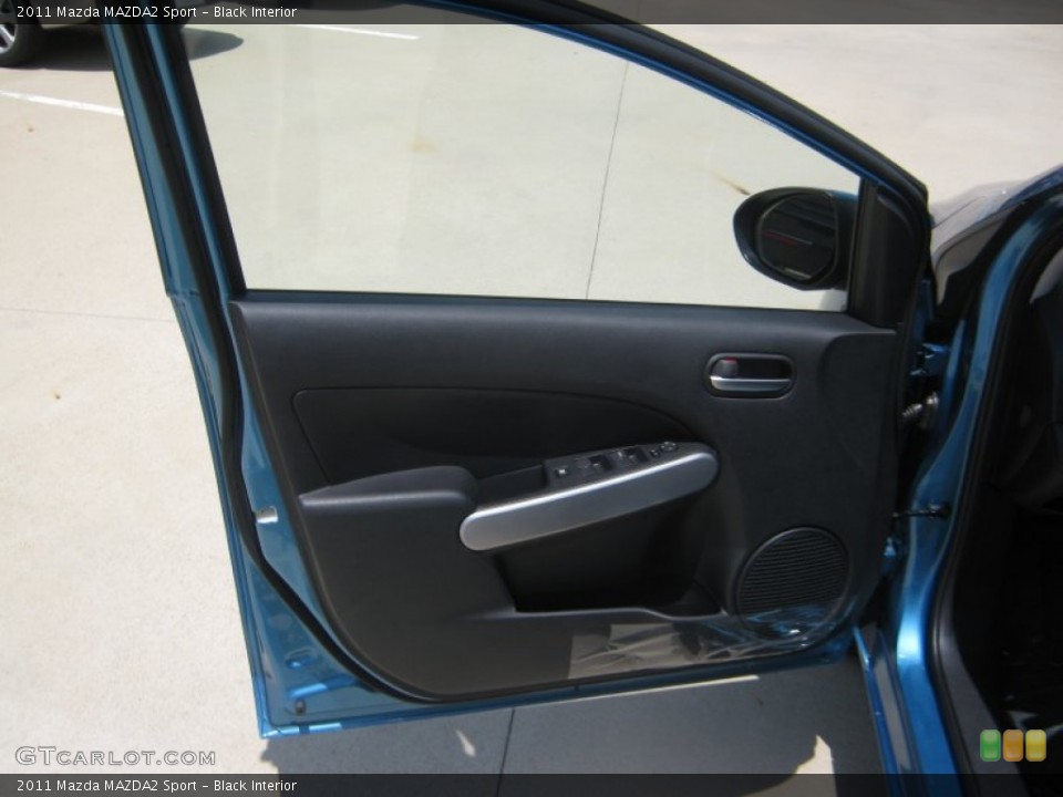 Black Interior Door Panel for the 2011 Mazda MAZDA2 Sport #49941938