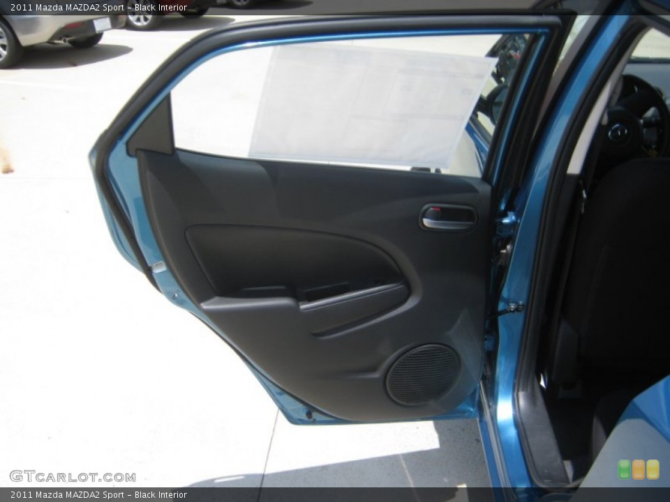 Black Interior Door Panel for the 2011 Mazda MAZDA2 Sport #49941968