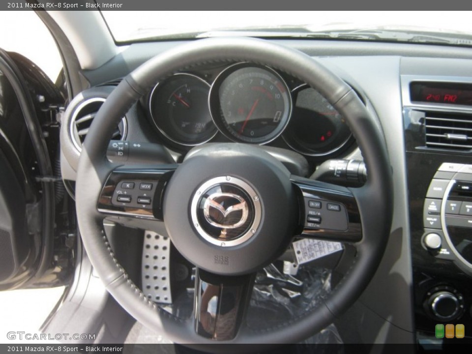 Black Interior Steering Wheel for the 2011 Mazda RX-8 Sport #49942226