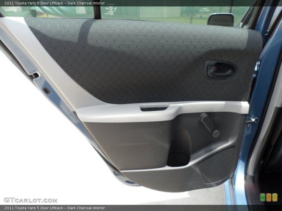 Dark Charcoal Interior Door Panel for the 2011 Toyota Yaris 5 Door Liftback #49946861