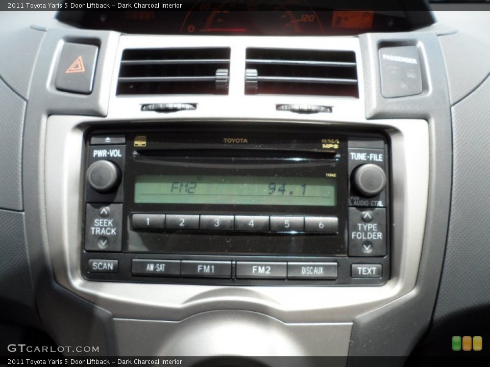 Dark Charcoal Interior Controls for the 2011 Toyota Yaris 5 Door Liftback #49946966