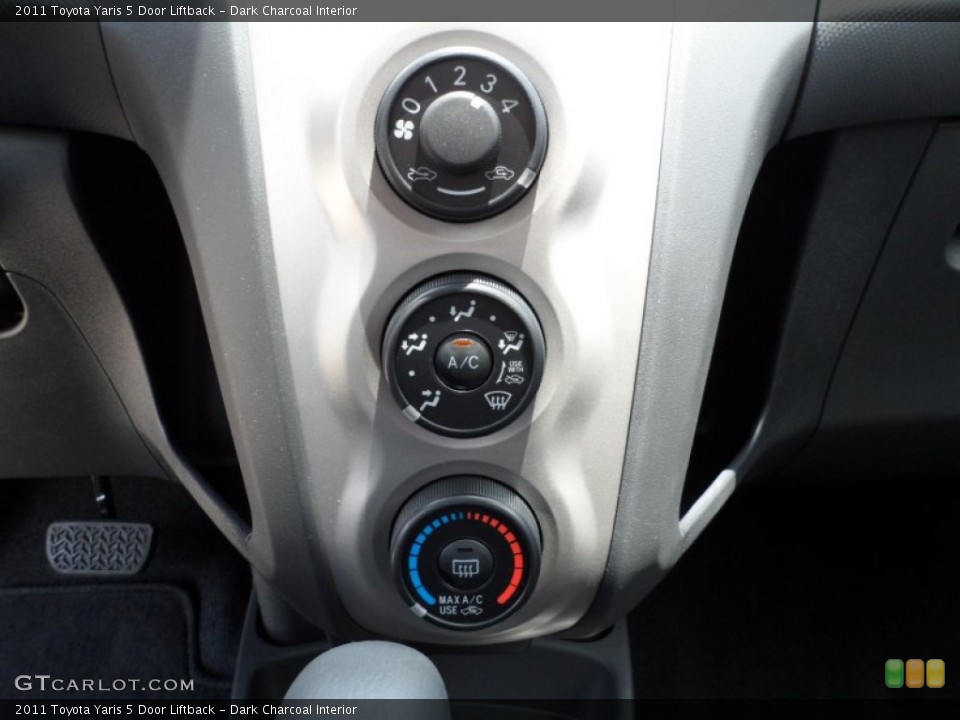 Dark Charcoal Interior Controls for the 2011 Toyota Yaris 5 Door Liftback #49946975