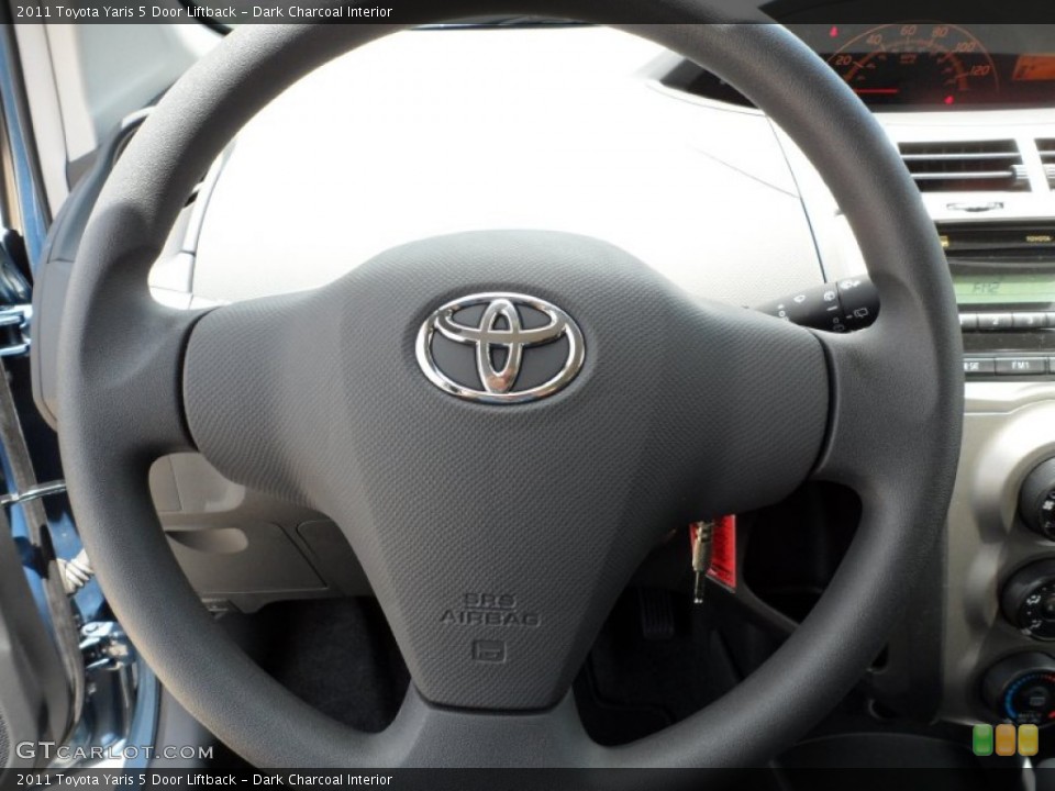 Dark Charcoal Interior Steering Wheel for the 2011 Toyota Yaris 5 Door Liftback #49946999