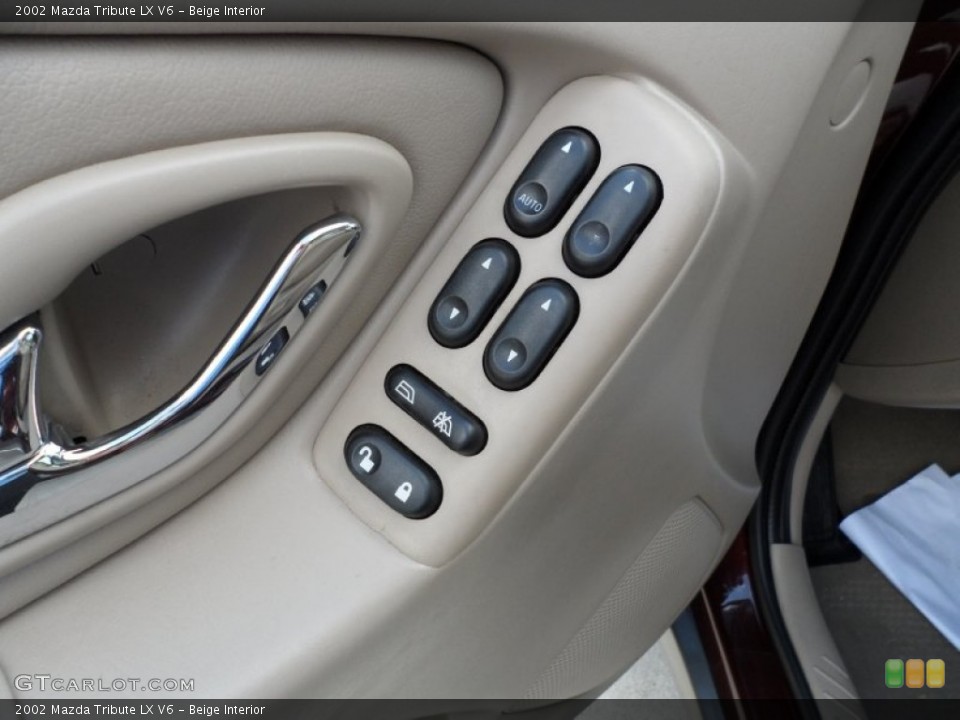 Beige Interior Controls for the 2002 Mazda Tribute LX V6 #49949222