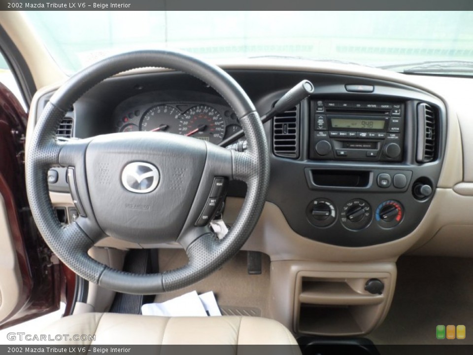 Beige Interior Dashboard for the 2002 Mazda Tribute LX V6 #49949255