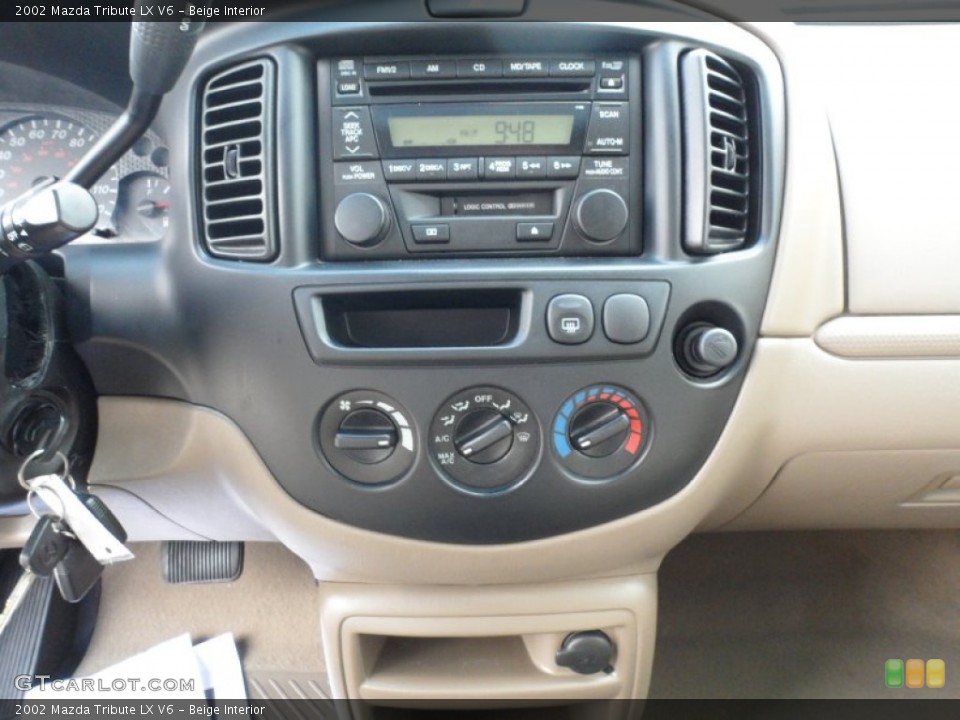 Beige Interior Controls for the 2002 Mazda Tribute LX V6 #49949264