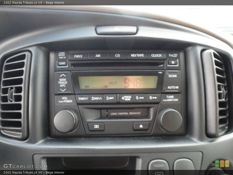 Beige Interior Controls for the 2002 Mazda Tribute LX V6 #49949270