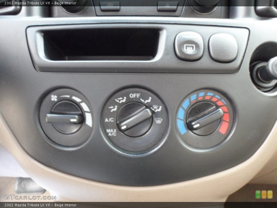 Beige Interior Controls for the 2002 Mazda Tribute LX V6 #49949279