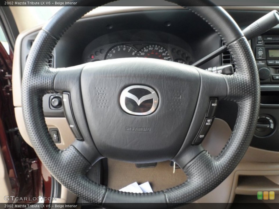 Beige Interior Steering Wheel for the 2002 Mazda Tribute LX V6 #49949285