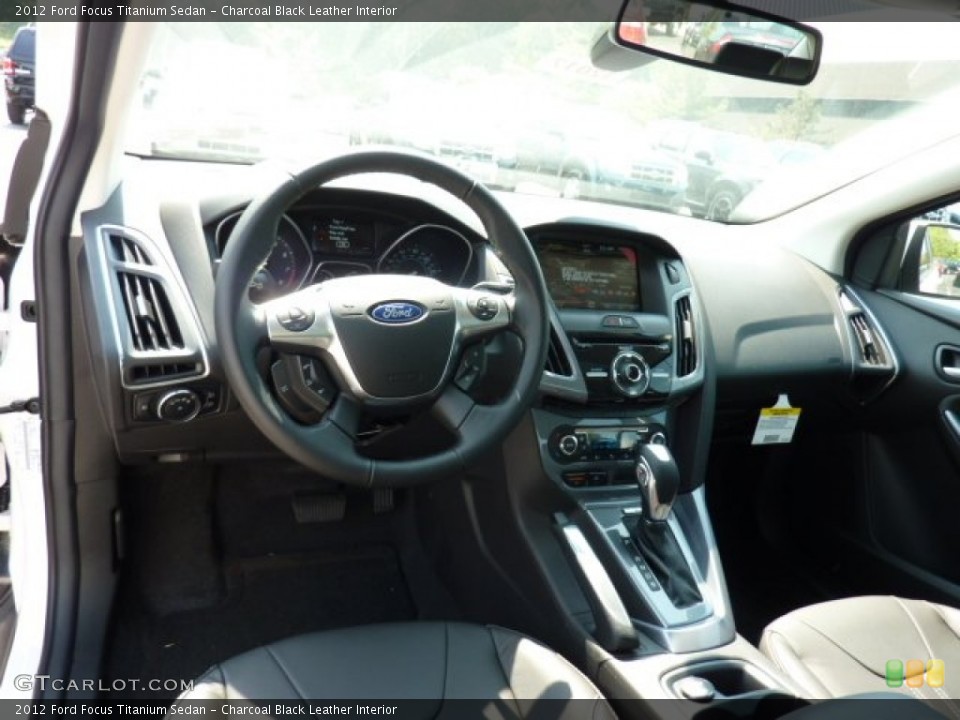 Charcoal Black Leather Interior Dashboard for the 2012 Ford Focus Titanium Sedan #50014195