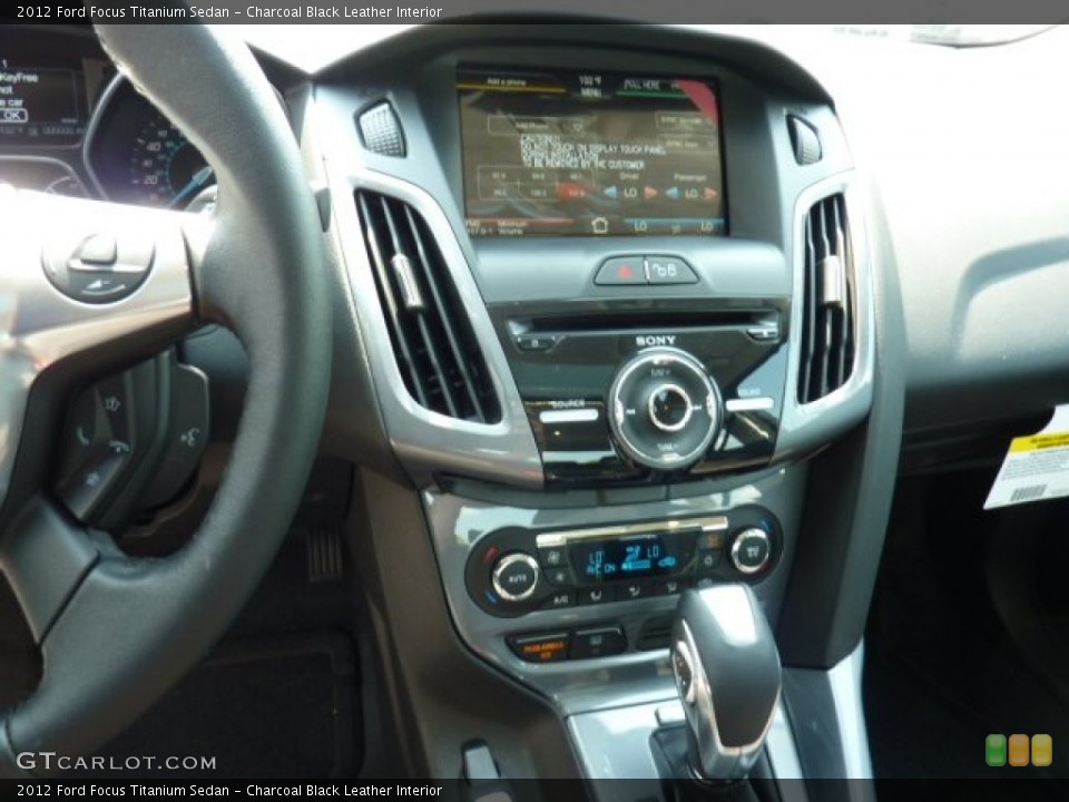 Charcoal Black Leather Interior Controls for the 2012 Ford Focus Titanium Sedan #50014234