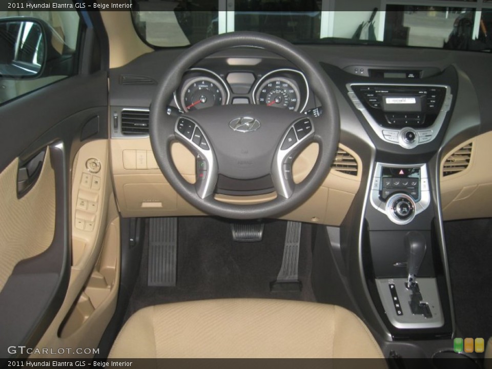 Beige Interior Dashboard for the 2011 Hyundai Elantra GLS #50049078