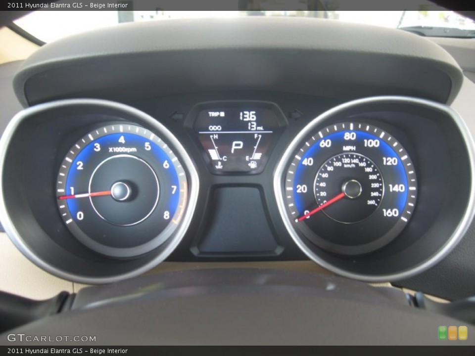 Beige Interior Gauges for the 2011 Hyundai Elantra GLS #50049159