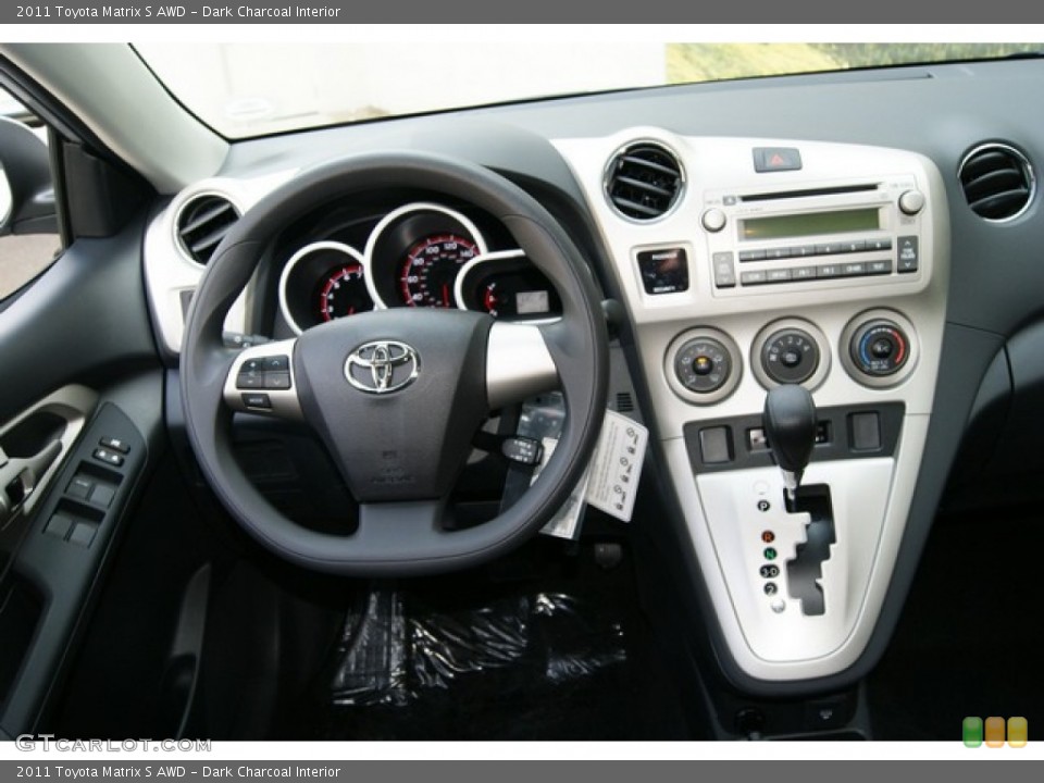Dark Charcoal Interior Dashboard for the 2011 Toyota Matrix S AWD #50058094