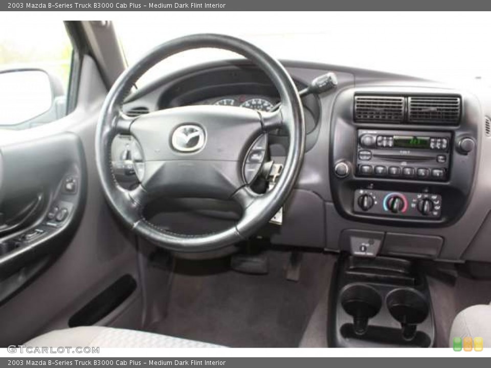 Medium Dark Flint Interior Dashboard for the 2003 Mazda B-Series Truck B3000 Cab Plus #50087079