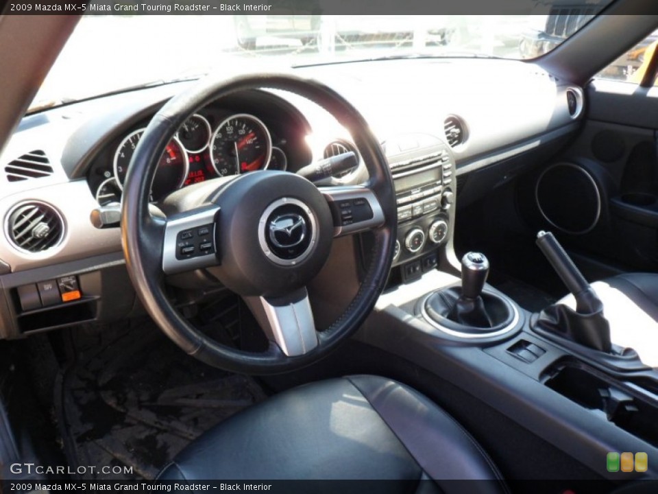 Black Interior Dashboard for the 2009 Mazda MX-5 Miata Grand Touring Roadster #50140576