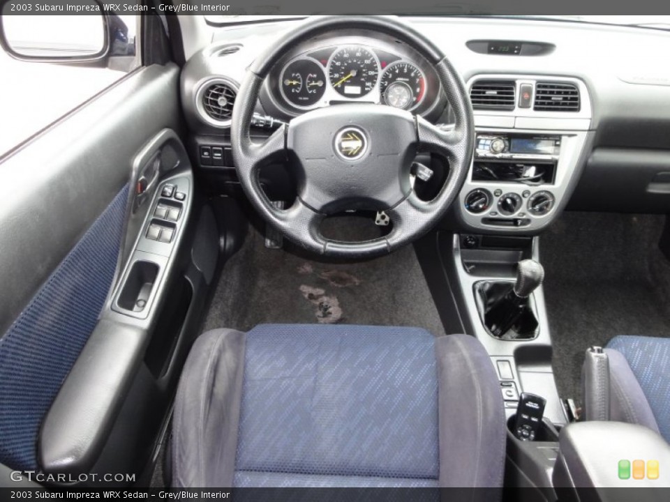 Grey/Blue Interior Dashboard for the 2003 Subaru Impreza WRX Sedan #50170241