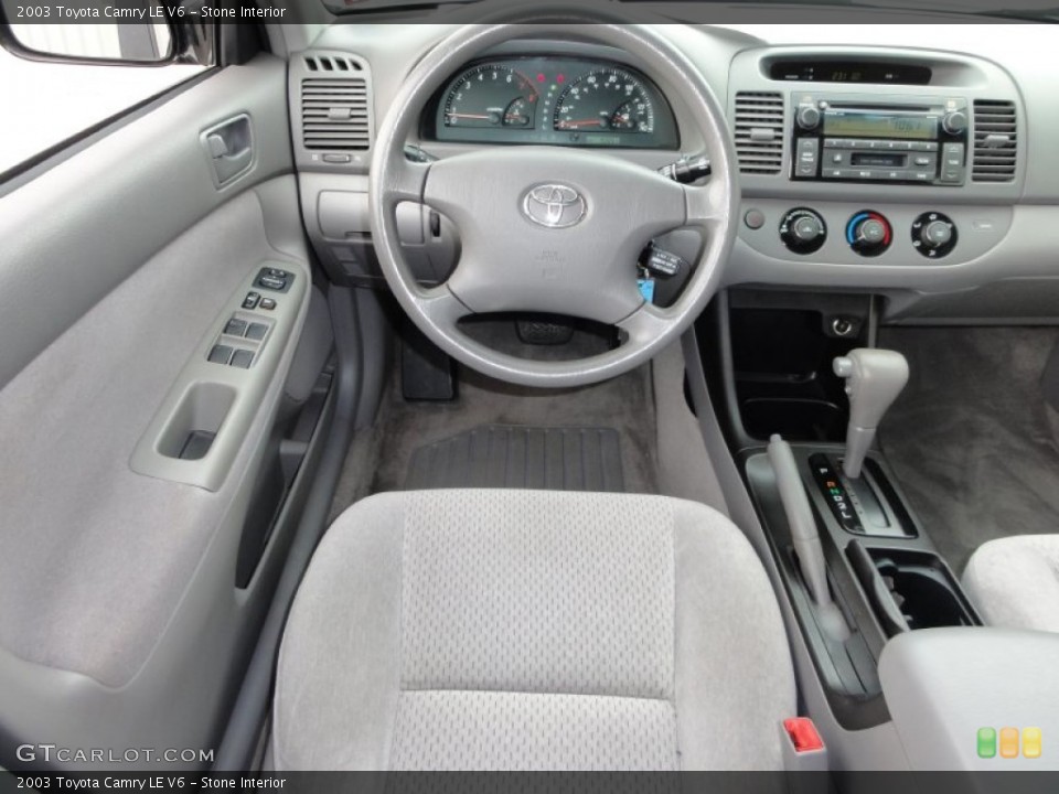 Stone Interior Dashboard for the 2003 Toyota Camry LE V6 #50174131
