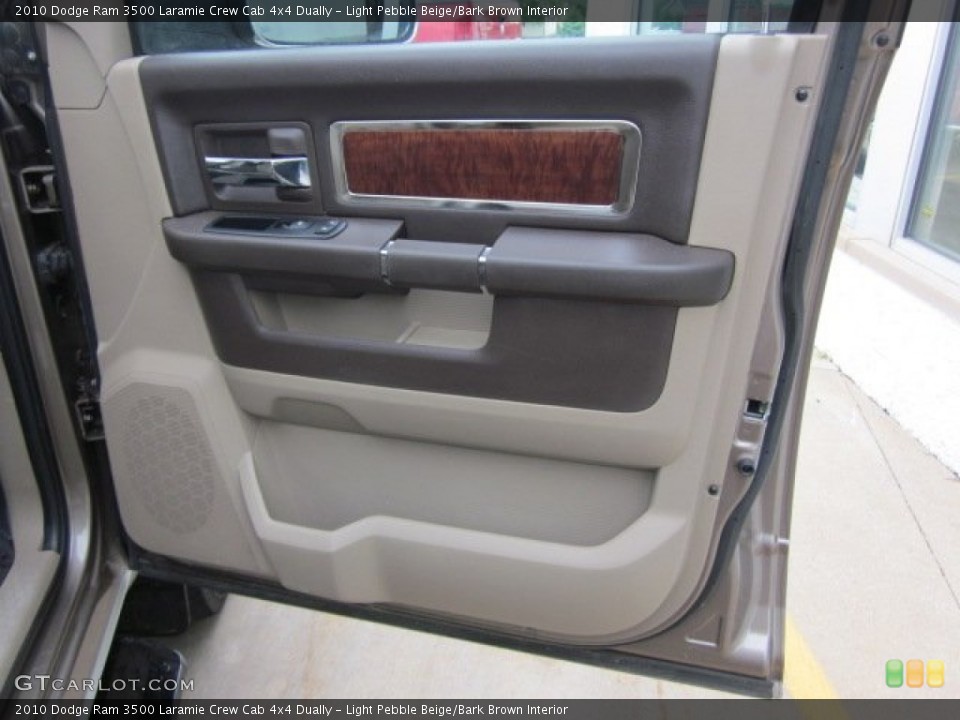 Light Pebble Beige/Bark Brown Interior Door Panel for the 2010 Dodge Ram 3500 Laramie Crew Cab 4x4 Dually #50178635
