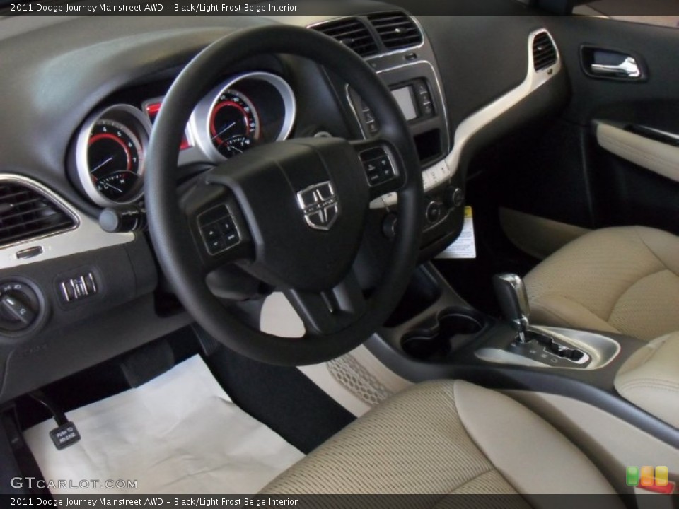 Black/Light Frost Beige Interior Prime Interior for the 2011 Dodge Journey Mainstreet AWD #50192454