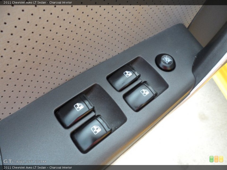 Charcoal Interior Controls for the 2011 Chevrolet Aveo LT Sedan #50232697