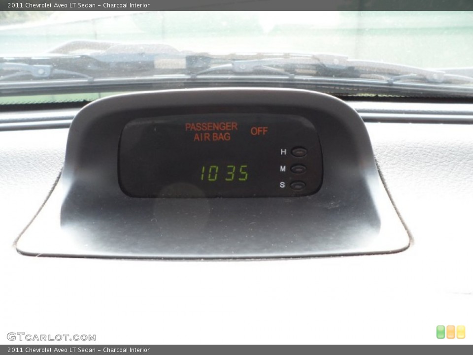 Charcoal Interior Controls for the 2011 Chevrolet Aveo LT Sedan #50232784
