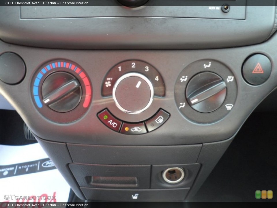 Charcoal Interior Controls for the 2011 Chevrolet Aveo LT Sedan #50232814