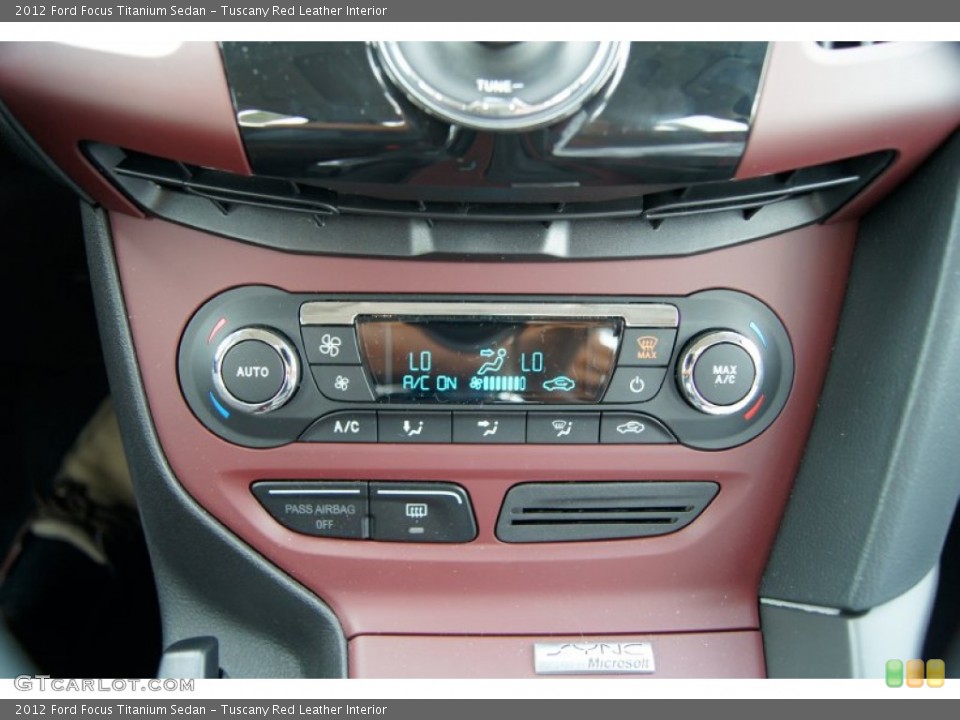 Tuscany Red Leather Interior Controls for the 2012 Ford Focus Titanium Sedan #50248126