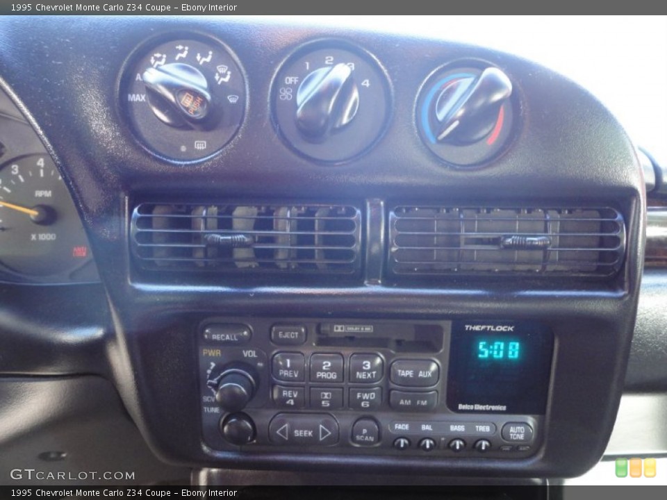 Ebony Interior Controls for the 1995 Chevrolet Monte Carlo Z34 Coupe #50262068