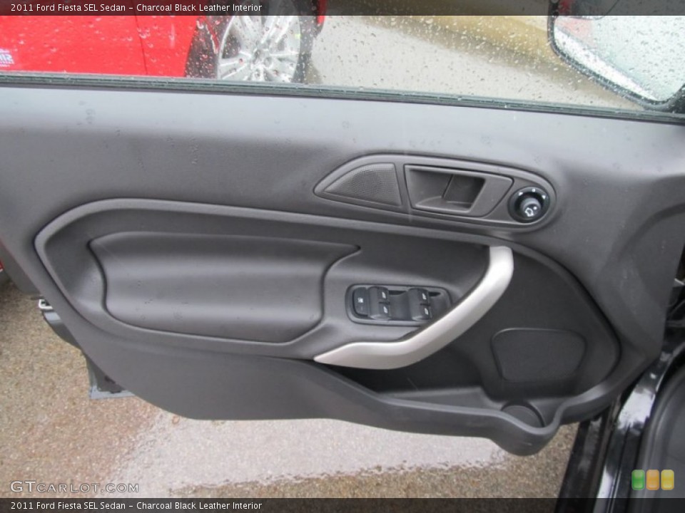 Charcoal Black Leather Interior Door Panel for the 2011 Ford Fiesta SEL Sedan #50269650