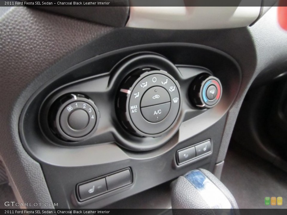 Charcoal Black Leather Interior Controls for the 2011 Ford Fiesta SEL Sedan #50269689