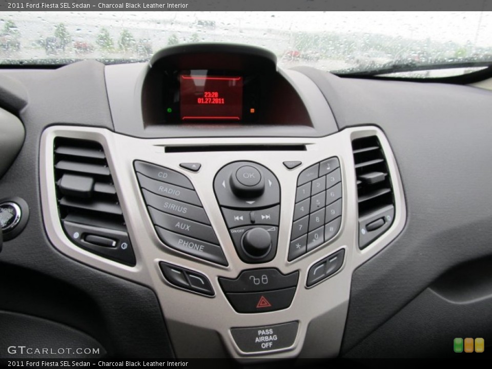 Charcoal Black Leather Interior Controls for the 2011 Ford Fiesta SEL Sedan #50269704