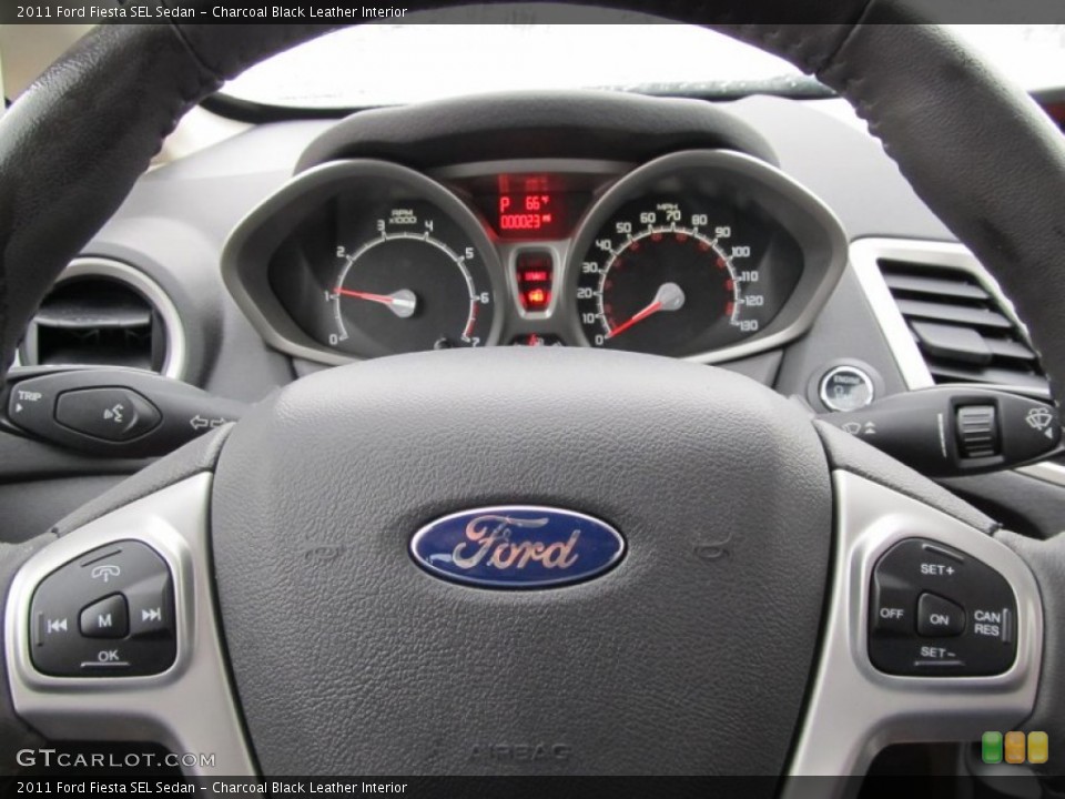 Charcoal Black Leather Interior Controls for the 2011 Ford Fiesta SEL Sedan #50269752