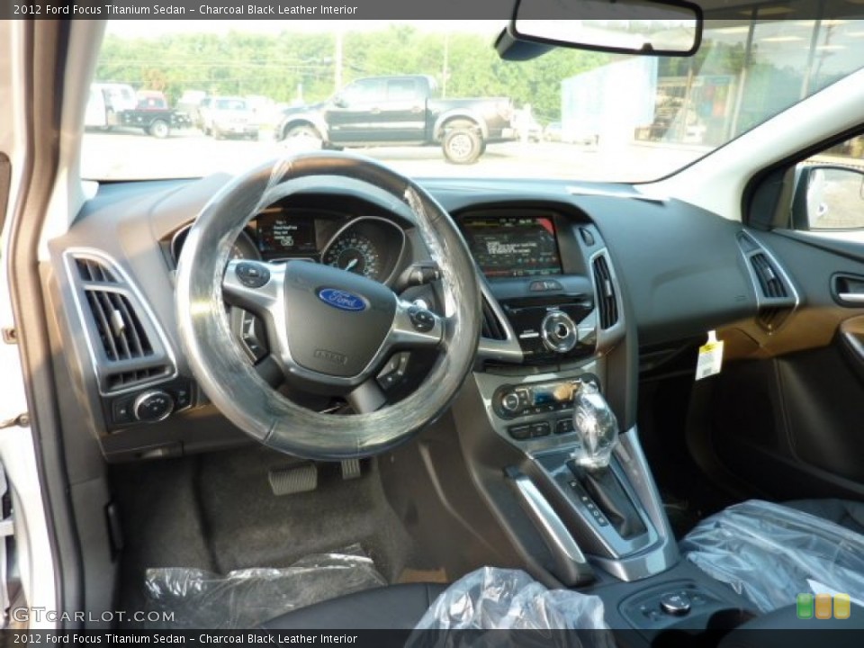 Charcoal Black Leather Interior Dashboard for the 2012 Ford Focus Titanium Sedan #50277639
