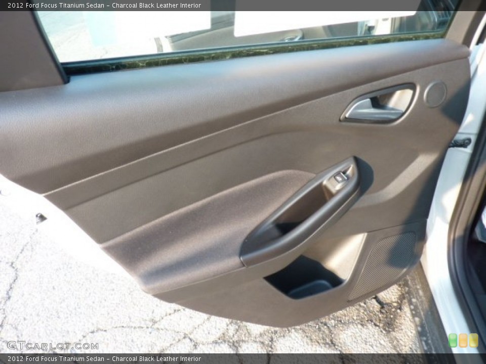 Charcoal Black Leather Interior Door Panel for the 2012 Ford Focus Titanium Sedan #50277657