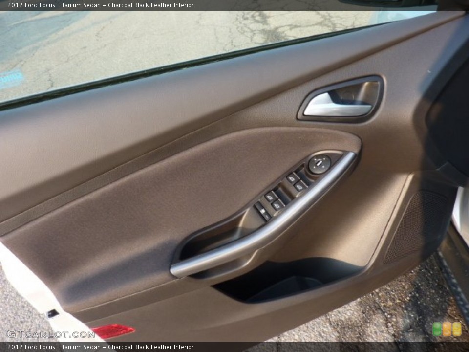 Charcoal Black Leather Interior Door Panel for the 2012 Ford Focus Titanium Sedan #50277672
