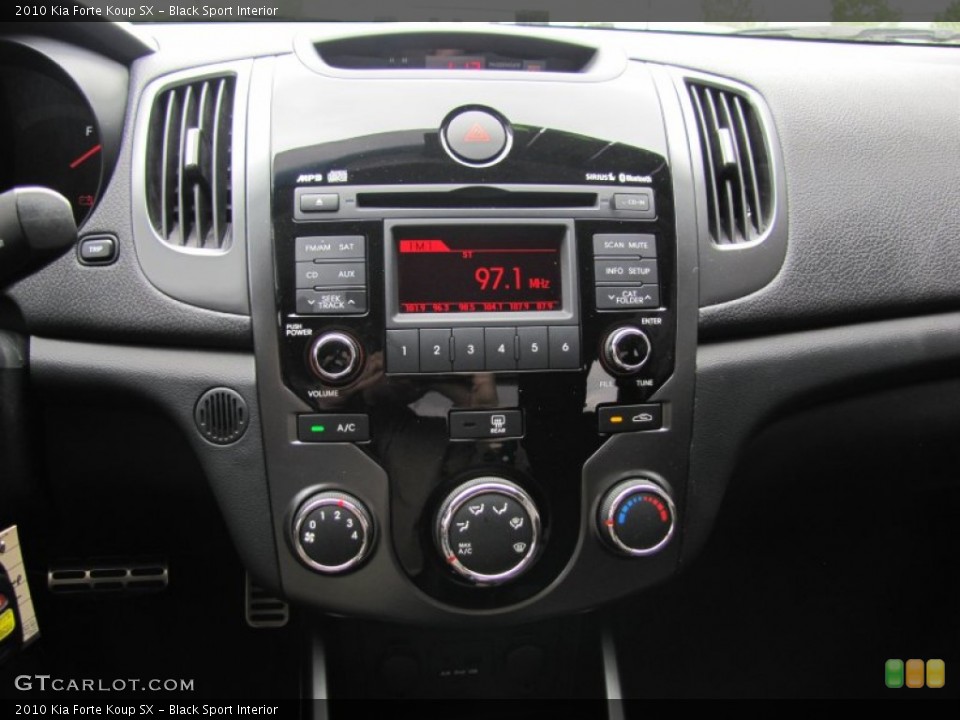 Black Sport Interior Controls for the 2010 Kia Forte Koup SX #50279535
