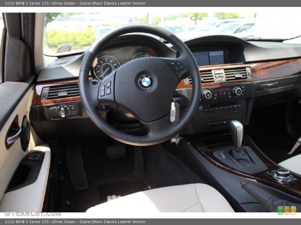 Oyster/Black Dakota Leather Interior Dashboard for the 2010 BMW 3 Series 335i xDrive Sedan #50299122