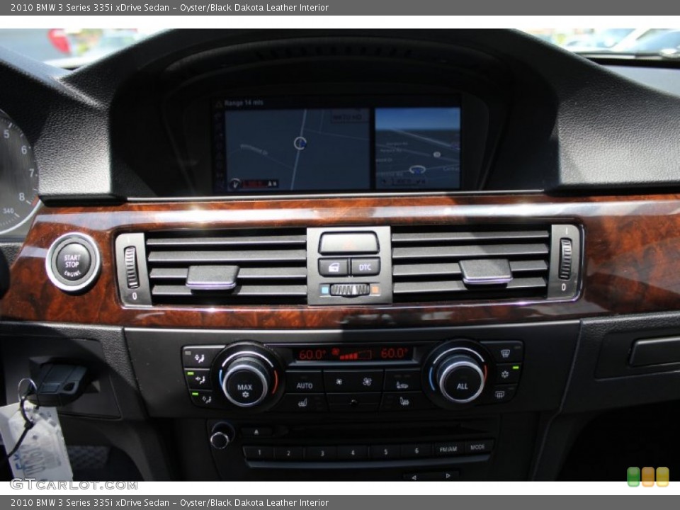 Oyster/Black Dakota Leather Interior Controls for the 2010 BMW 3 Series 335i xDrive Sedan #50299155