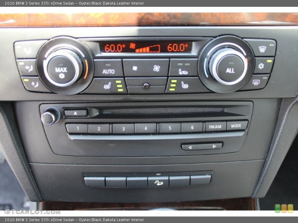 Oyster/Black Dakota Leather Interior Controls for the 2010 BMW 3 Series 335i xDrive Sedan #50299179