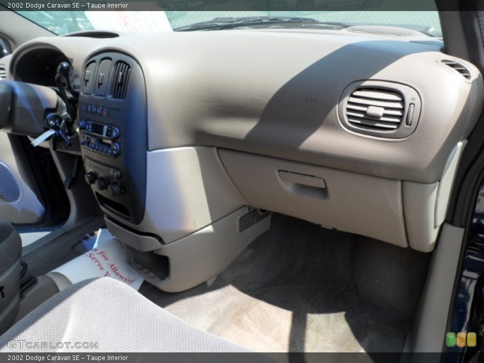Taupe Interior Dashboard for the 2002 Dodge Caravan SE #50317623