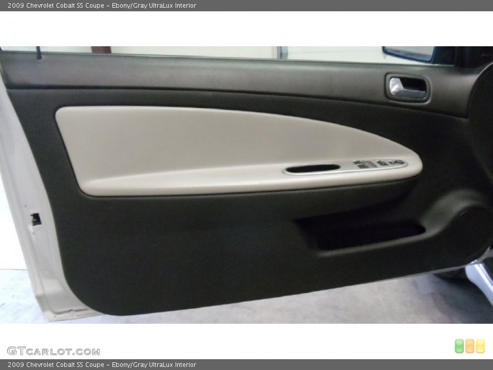 Ebony/Gray UltraLux Interior Door Panel for the 2009 Chevrolet Cobalt SS Coupe #50335994