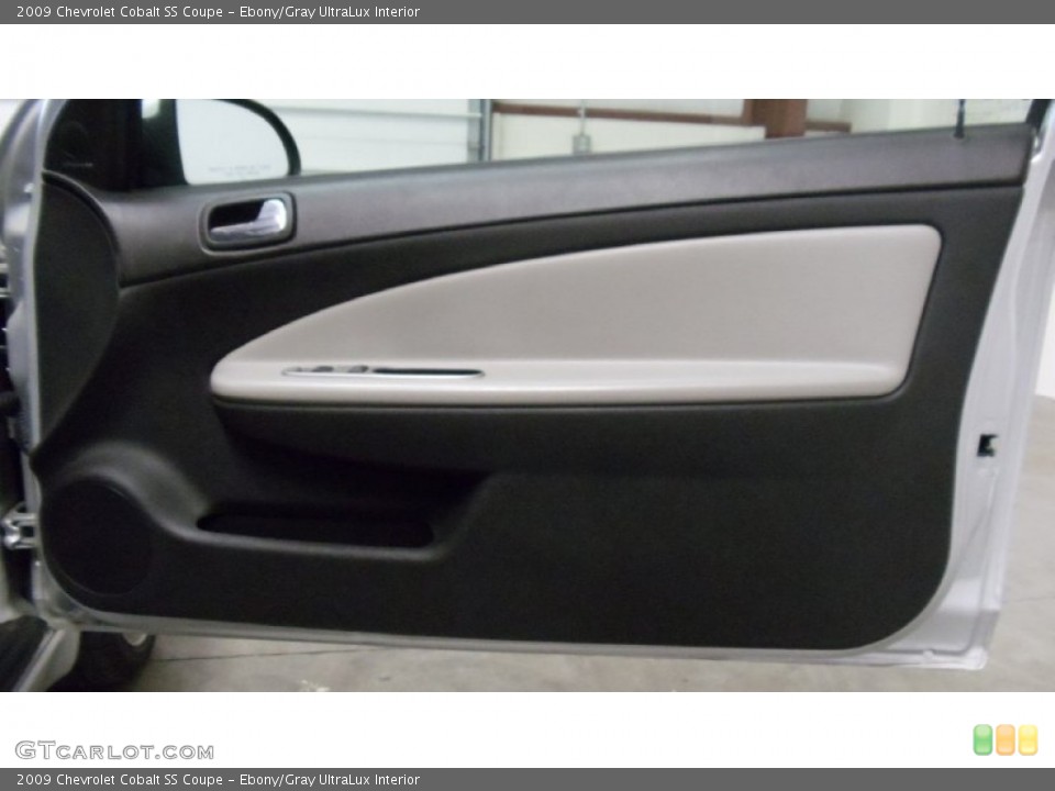 Ebony/Gray UltraLux Interior Door Panel for the 2009 Chevrolet Cobalt SS Coupe #50336009