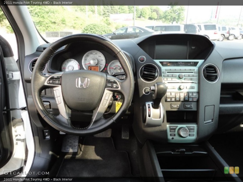 Black Interior Dashboard for the 2011 Honda Pilot Touring 4WD #50368167