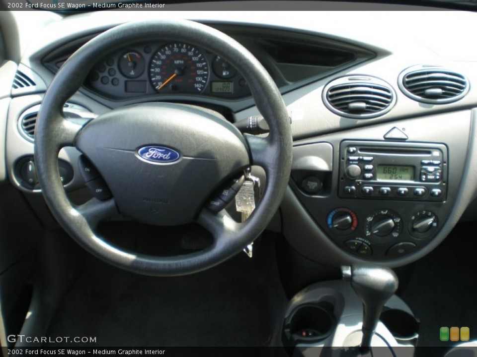 Medium Graphite Interior Dashboard for the 2002 Ford Focus SE Wagon #50434024