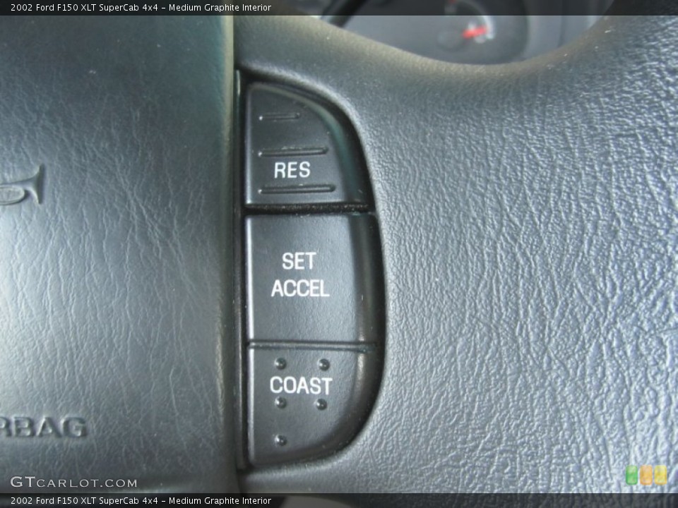 Medium Graphite Interior Controls for the 2002 Ford F150 XLT SuperCab 4x4 #50441734